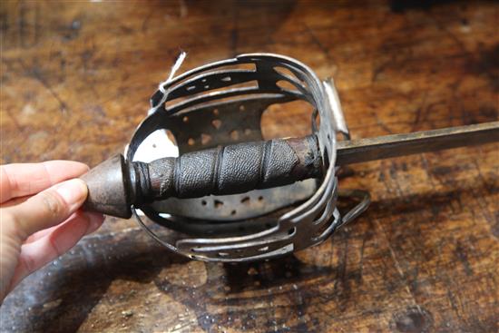 An 18th century Scottish basket hilted backsword,